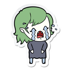 sticker of a cartoon crying vampire girl