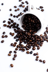 Cup with coffee bean on white