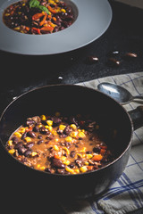 Chili corn carne on stone table