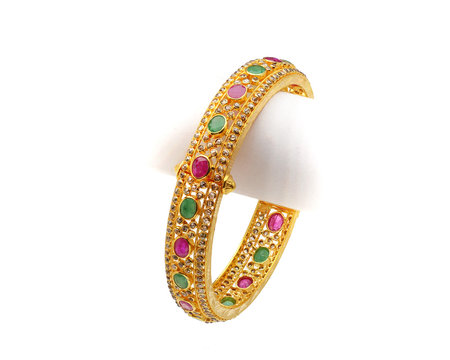 22k gold bangle on white background