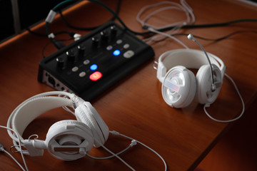 headphones and audio mixer equipment for simultaneous translation. translators workplace with...