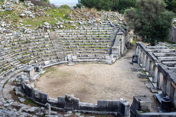 Fototapeta na wymiar Side view from inside of Priene ancient theater ruins
