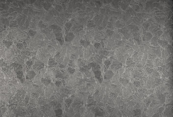texture of rough putty on the silver wall.