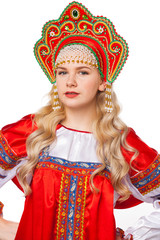 Traditional Russian folk costume, portrait of a young beautiful girl