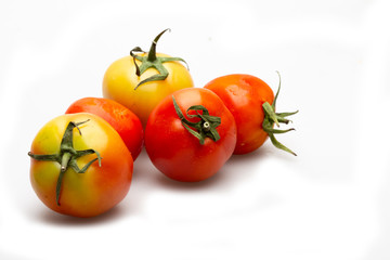 5 fresh tomatoes. isolated on white background