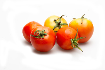 5 fresh tomatoes. isolated on white background