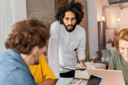 Business People Talking In Office Meeting