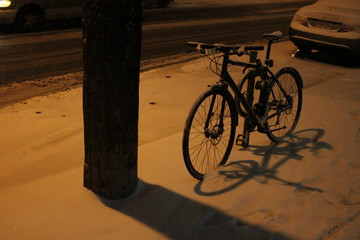 Fototapeta na wymiar Snow covered Bicycle