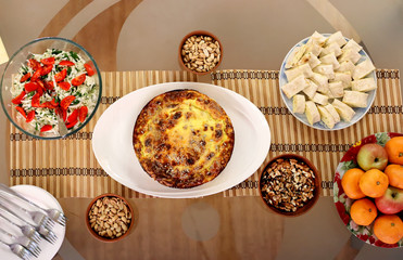 Glass dining table with healthy vegan food