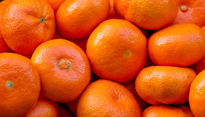 Pile of tangerines as a background