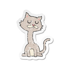 retro distressed sticker of a cartoon cat