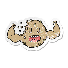 distressed sticker of a cartoon strong cookie