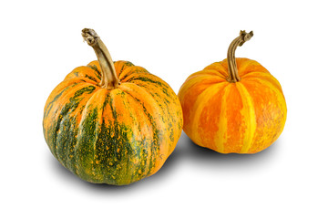 Big and small pumpkins isolated on white background