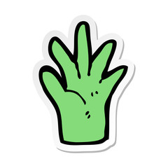 sticker of a cartoon green hand symbol