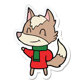 sticker of a friendly cartoon wolf in winter clothes