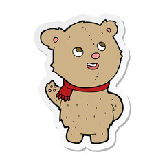 sticker of a cartoon cute teddy bear with scarf