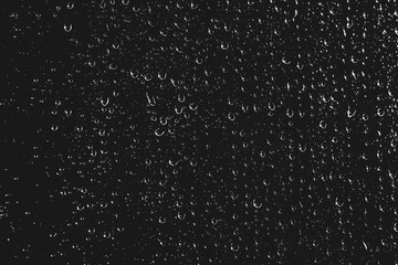 Dirty window glass with drops of rain. Atmospheric monochrome dark background with raindrops. Droplets and stains close up. Detailed transparent texture in macro with copy space. Night rainy weather. - Powered by Adobe