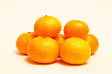 Tangerines close-up. Isolated object on white background.