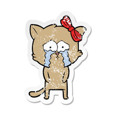 distressed sticker of a cartoon cat