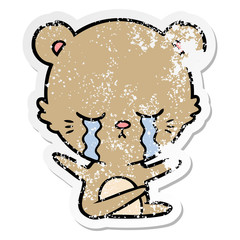 distressed sticker of a crying cartoon bear