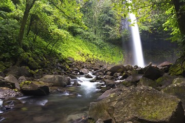 Beautiful Cascading Waterfall in Costa Rica Tropical Rainforest Jungle near La Fortuna in Arenal National Park