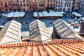 Warsaw, Poland Old town market square with street during sunny summer day old market square in town with restaurants view from window roof rooftop