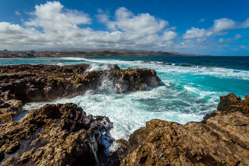 Travels. Canary archipelago. Gran Canaria. Ocean and beach in Las Palmas