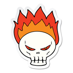 sticker of a cartoon flaming skull