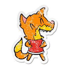 distressed sticker of a laughing fox cartoon