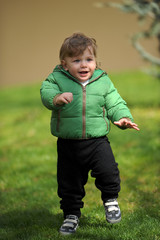 Fototapeta premium Baby's first outdoor walk