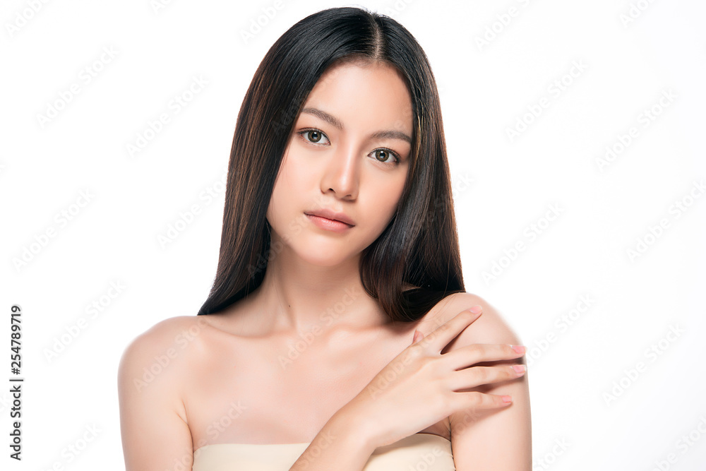 Wall mural beautiful young asian woman with clean fresh skin