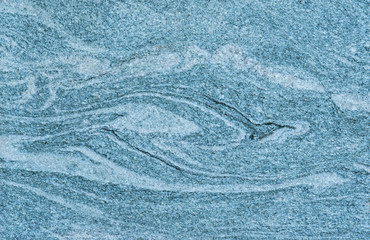 Granite wall with azure or bluish tint as background