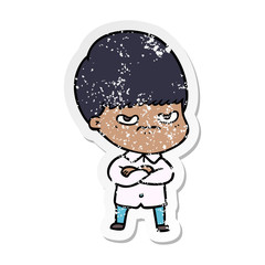 distressed sticker of a annoyed cartoon boy
