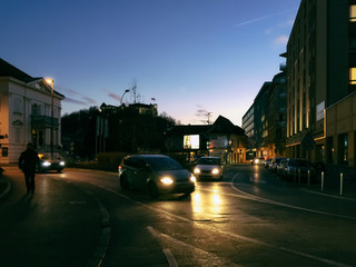 Road and cars in city center Ljubljana evening