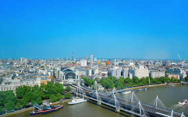 Hungerford Bridge above Thames River in London