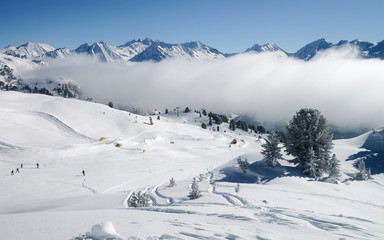 Fototapeta premium Clouds in Zillertal Arena ski resort Austria