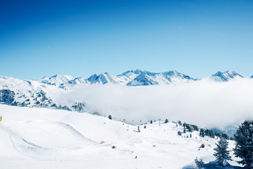 Fototapeta na wymiar Clouds at Zillertal Arena ski resort in Austria