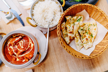 Naan bread tikka masala chicken with rice Indian food cuisine