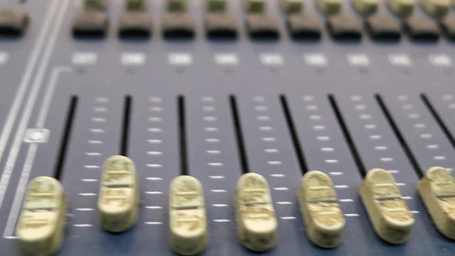 Sound Mixer Console With Audio Channel Faders Close-Up