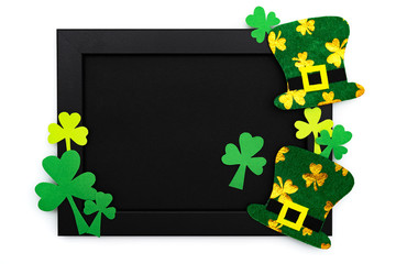 St Patricks day, festive leprechaun hat and green Shamrocks on photo frame