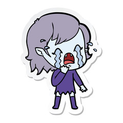 sticker of a cartoon crying vampire girl