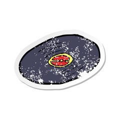 retro distressed sticker of a cartoon vinyl record