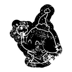 cute cartoon distressed icon of a elephant spouting water wearing santa hat