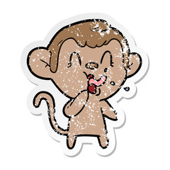 distressed sticker of a crazy cartoon monkey