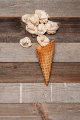 Crispy white meringue in ice cream cone