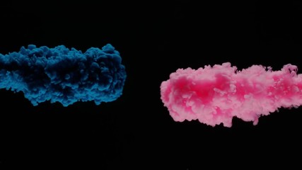 Super slowmotion shot of color inks in water. Shot with high speed camera at 4K.