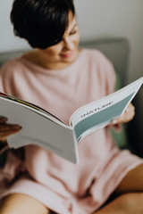 Woman reading a magazine