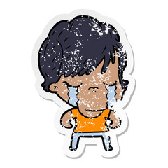 distressed sticker of a cartoon woman crying