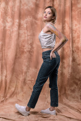 Serious good looking woman working as a model