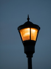 Fototapeta na wymiar Street Light against a dark blue sky 